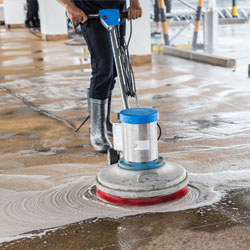 Man Using A Polishing Machine